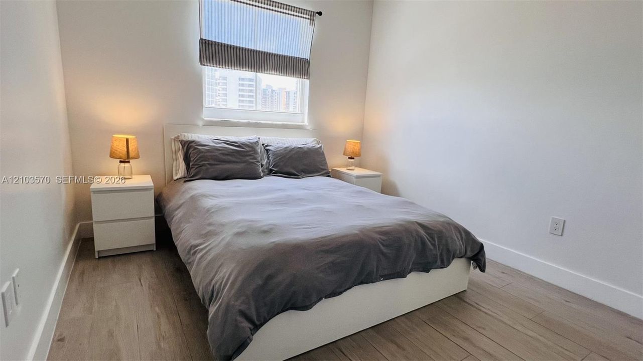 bedroom 2 with queen bed
