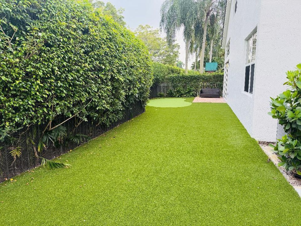 Rear Turfed Area / Putting Green