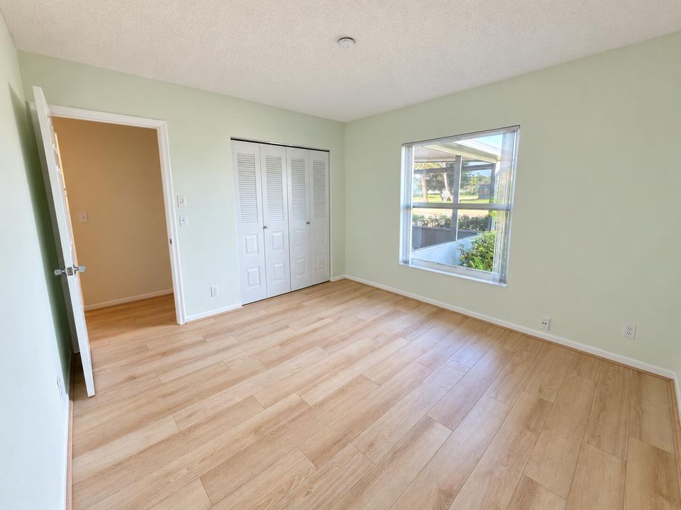 Brightened mint bedroom, clutter-free co