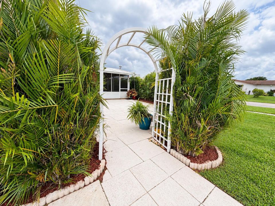 Garden Arch with Lush Green Lawn