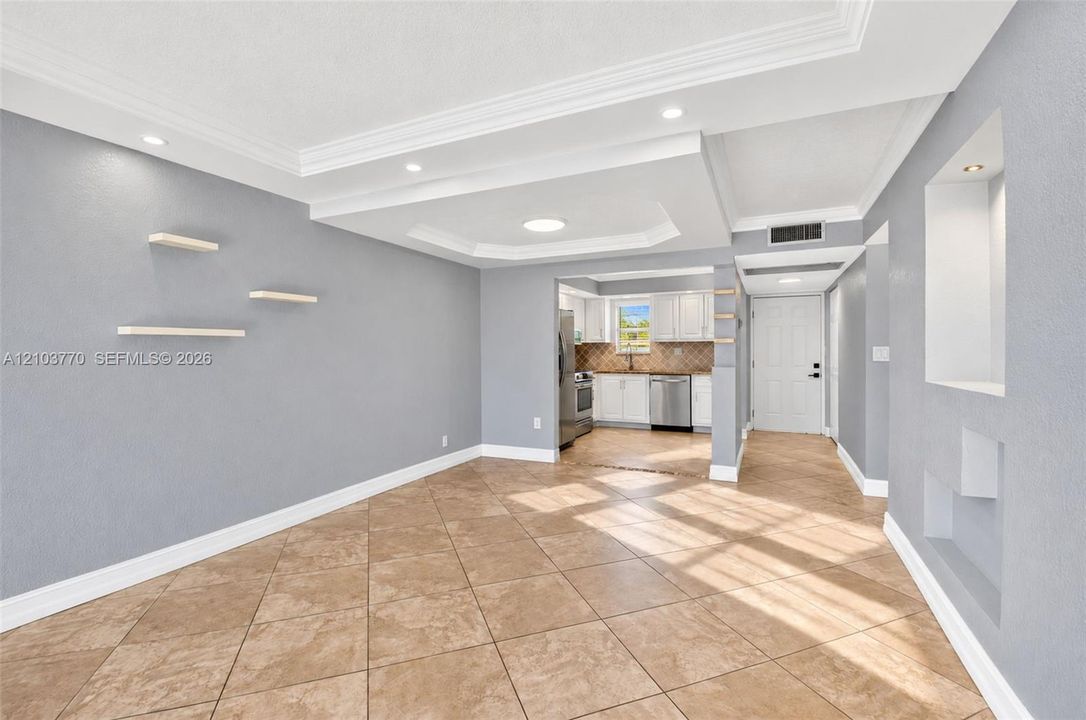 Tiled flooring and crown molding throughout