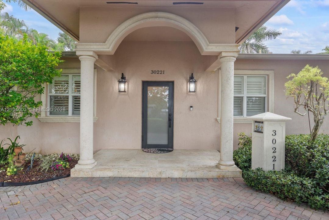 Front Grand Covered Entrance