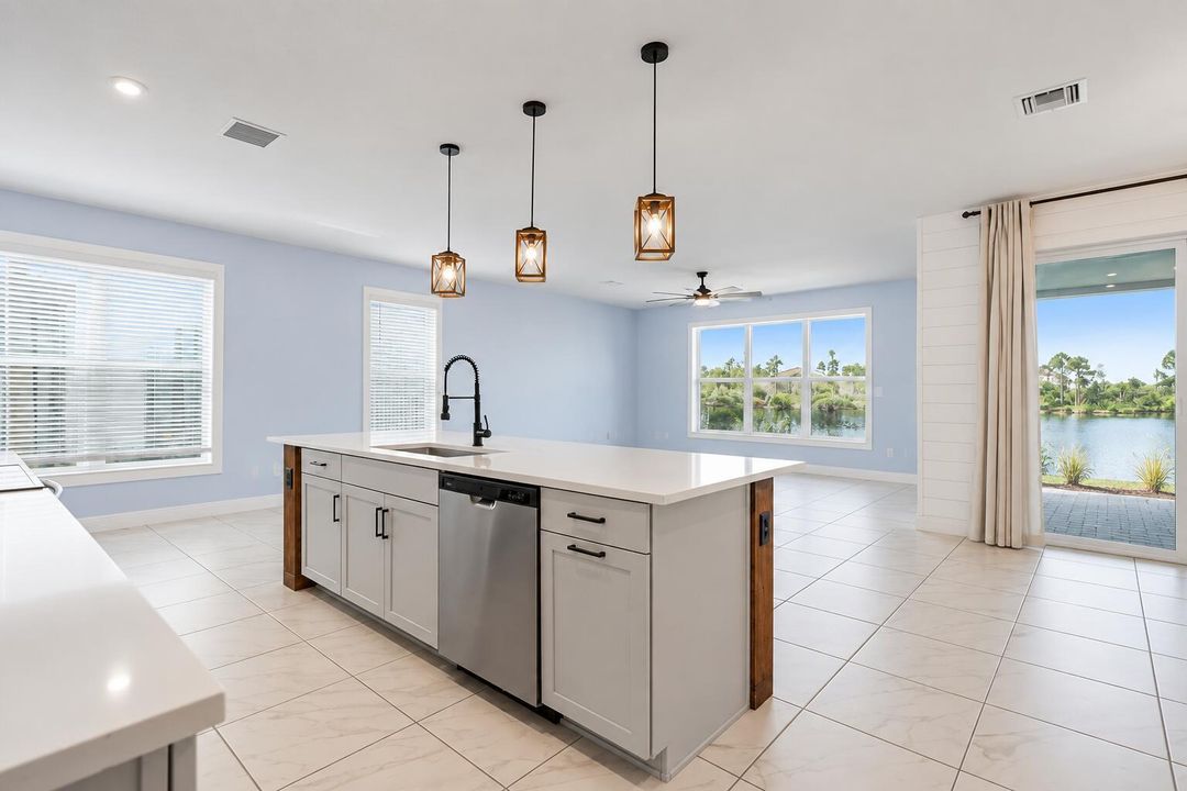 Bright Coastal Kitchen with Lake Views