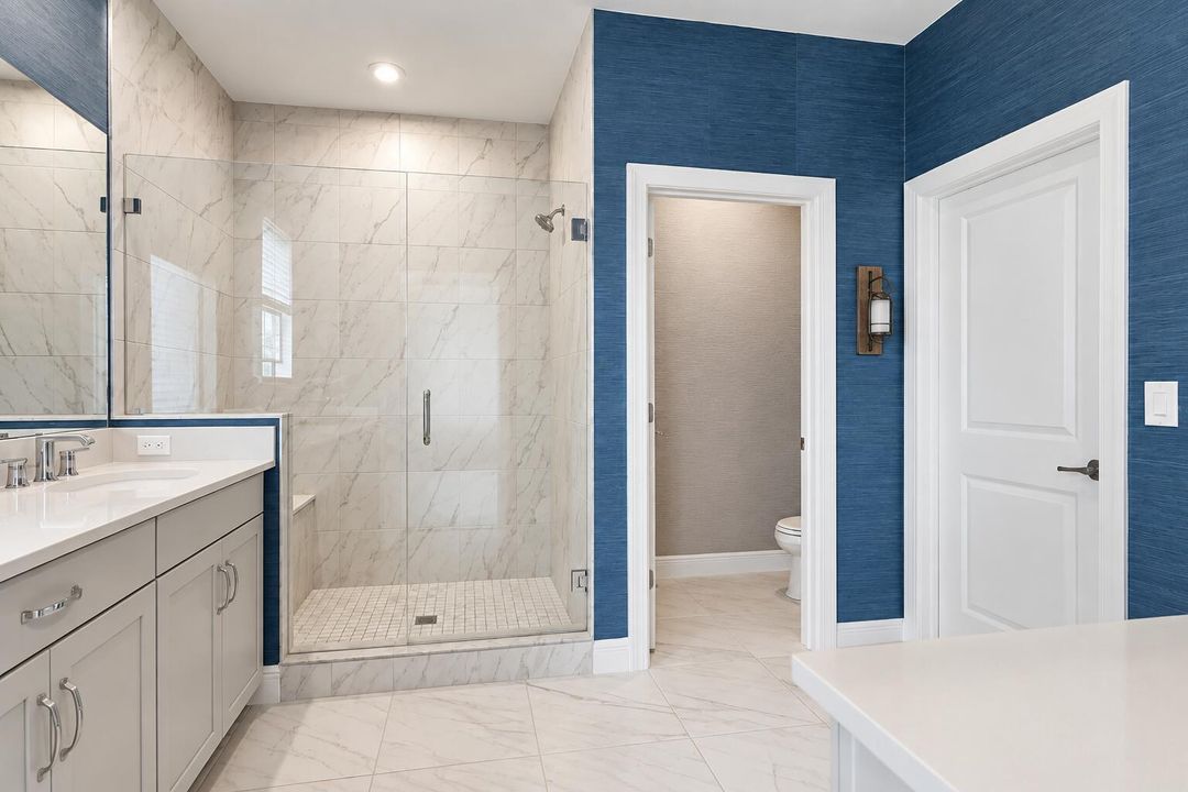 Modern Blue and Marble Bathroom