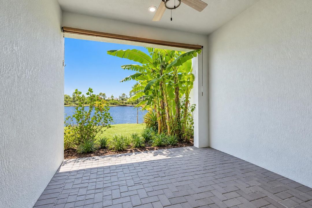 Bright Lanai Overlooking a Tropical Lake