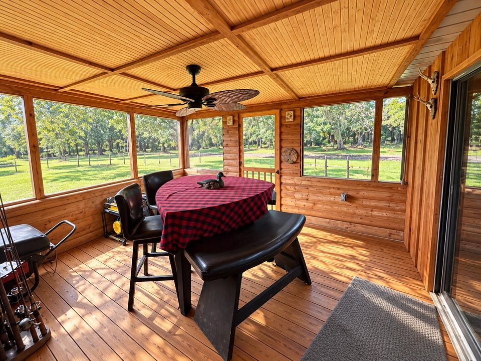 Sunlit Rustic Screened Porch Retreat
