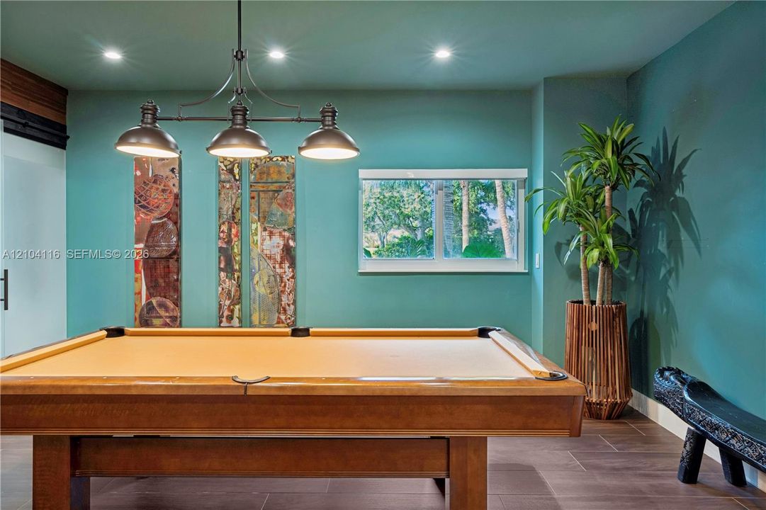 Recessed lighting, window, and a wooden-finish flooring