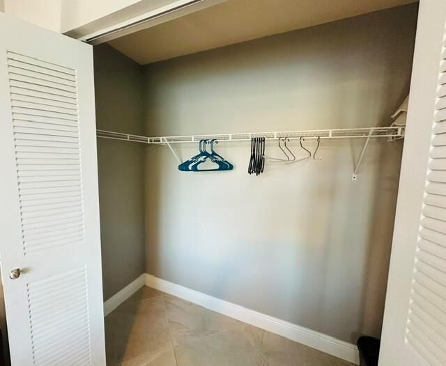 guest bedroom with huge closet