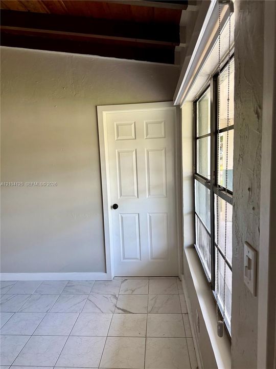 View from entrance / front door facing the primary bedroom.