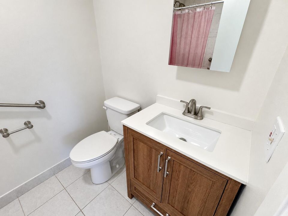 Bright Modern Bathroom with Oak Vanity