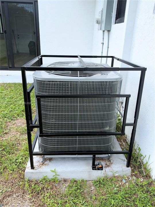 AC Unit with security cage