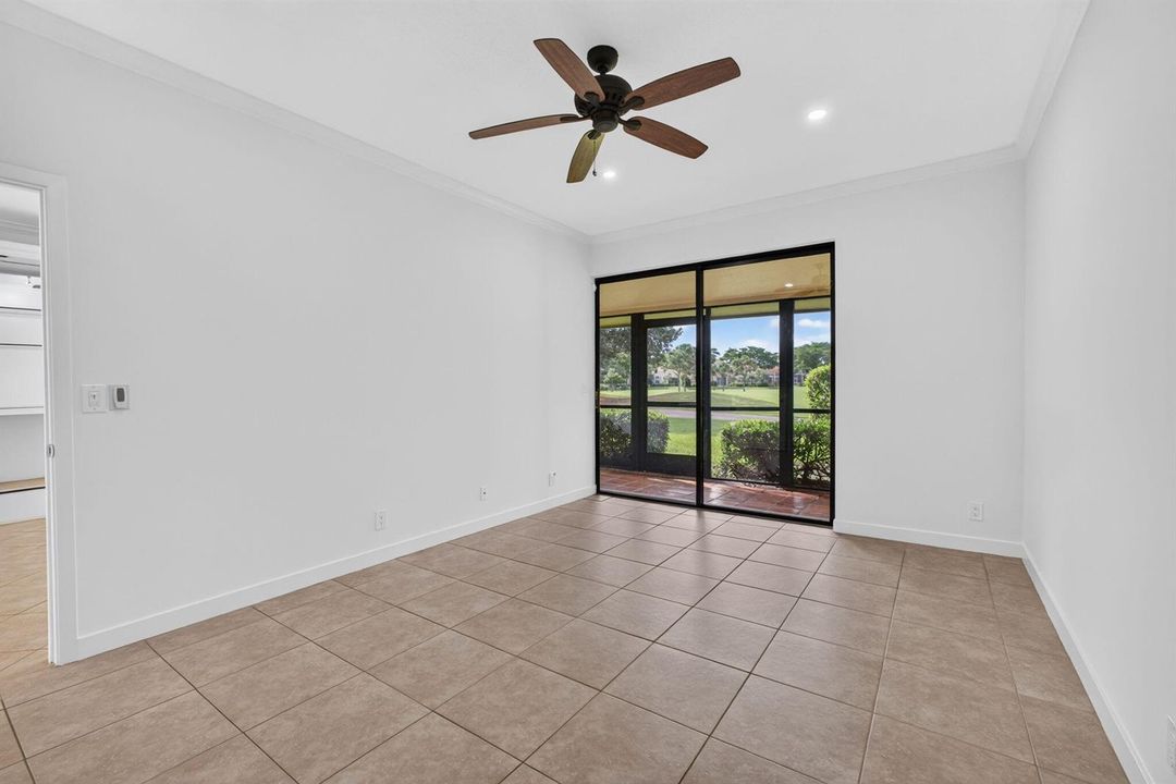 11 - Bedroom with tile flooring