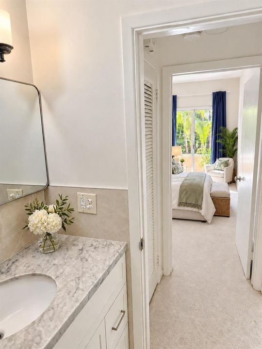 Staged Bathroom View into Bedroom