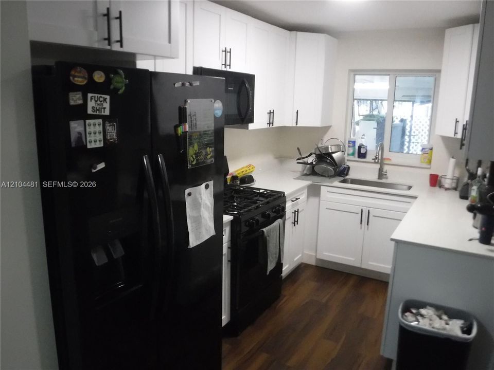 Kitchen Updated in 2025, Black Appliances