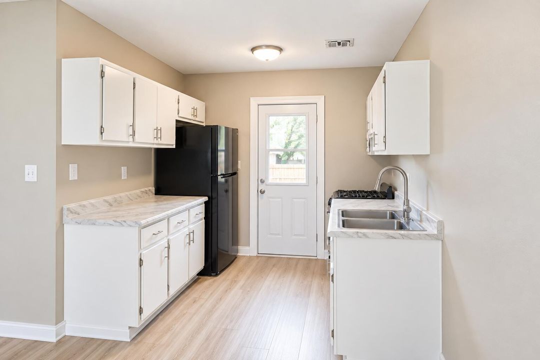 Bright Minimalist Galley Kitchen