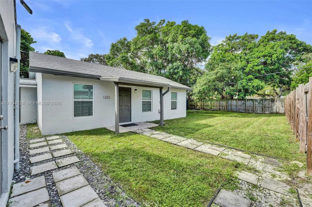 Fully fenced yard between the units