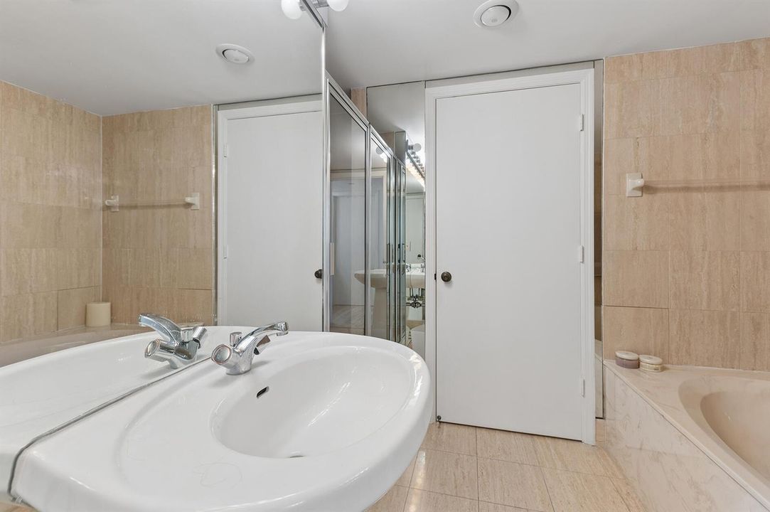 Master bathroom with tub