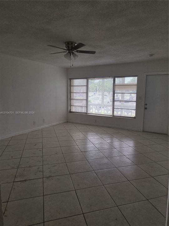 Living room with a door to the balcony