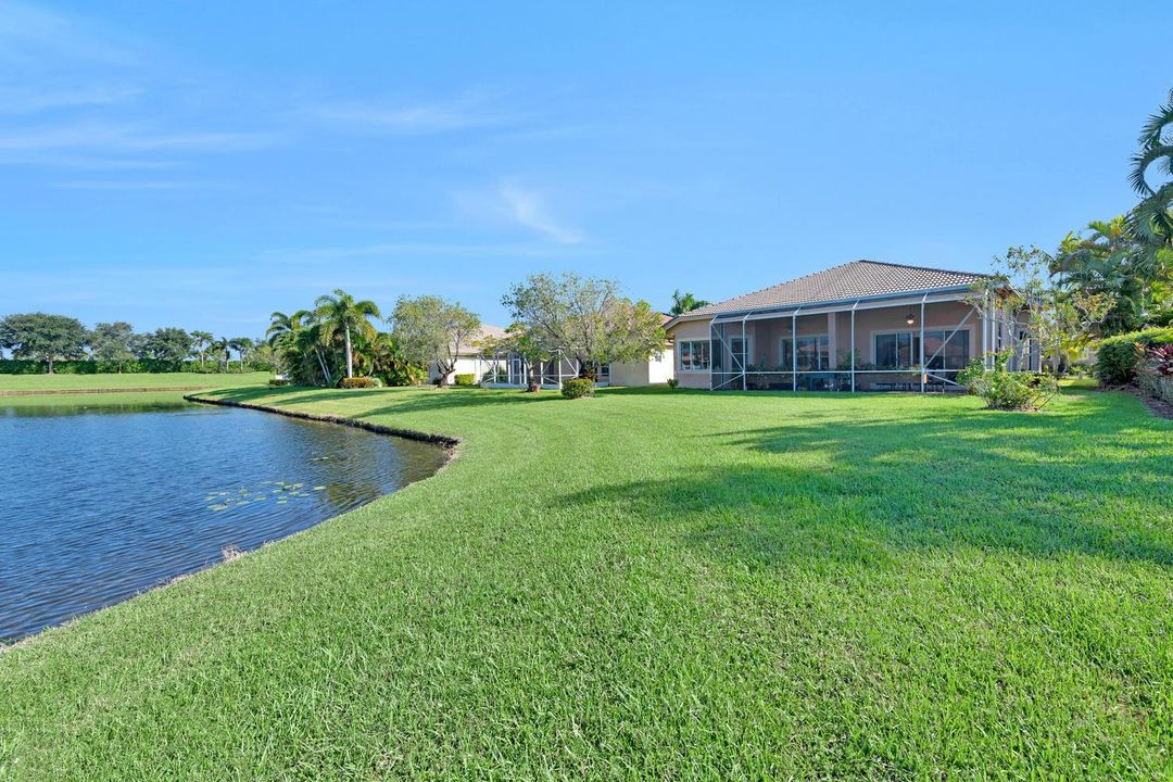 Rear to Patio & Lake