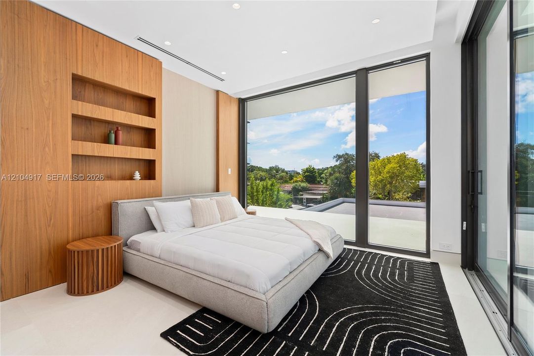 Floor-to-ceiling windows with black frames