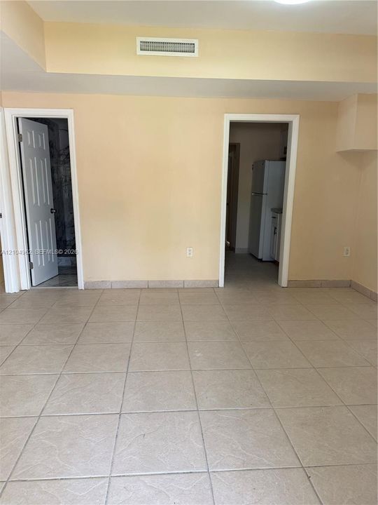 Ceramic tile flooring, interior doors, and a built-in shelf