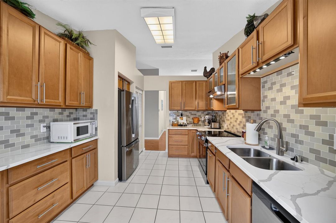 Kitchen - Quartz & Wood Cabinets