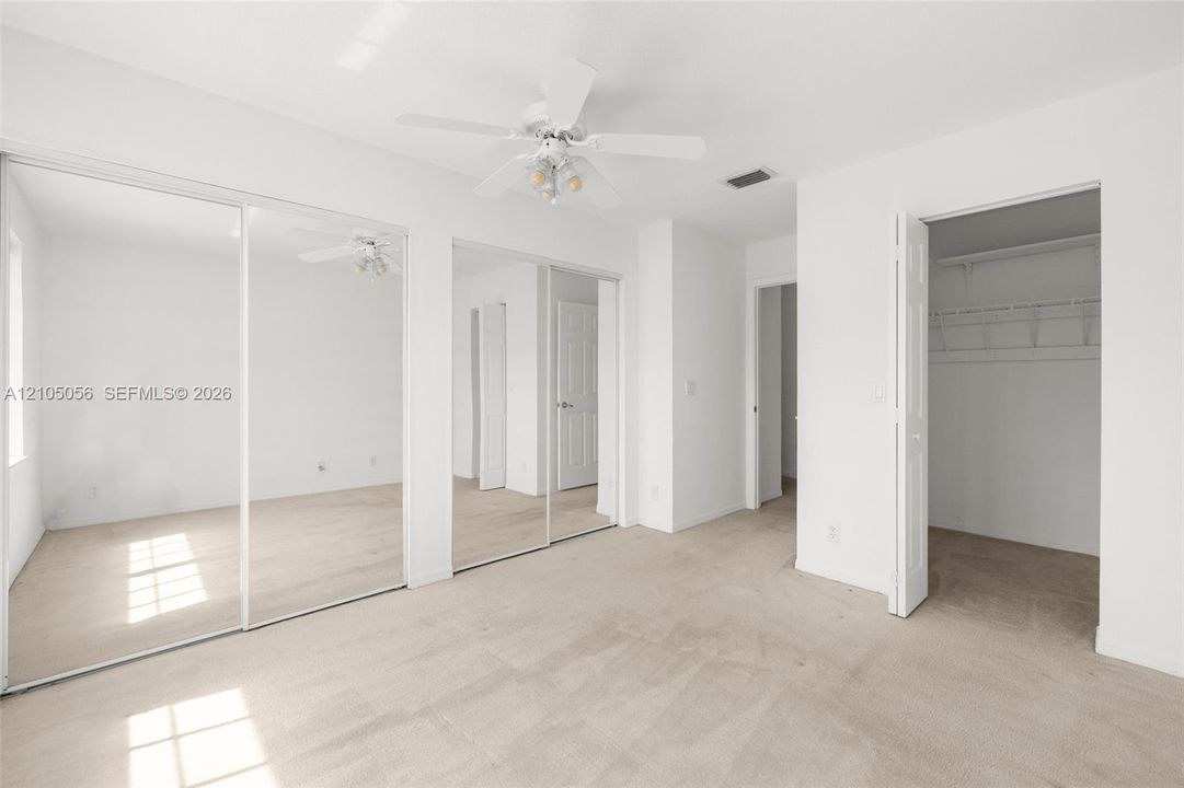 3rd Bedroom -  dual-panel mirrored closet doors, and auxiliary closet