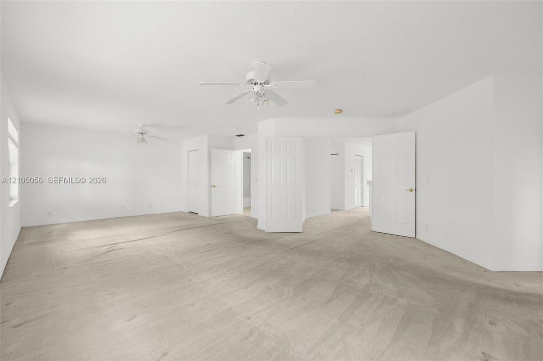 Expansive Primary with generous sitting area -developer option - easily converts to 5th bedroom