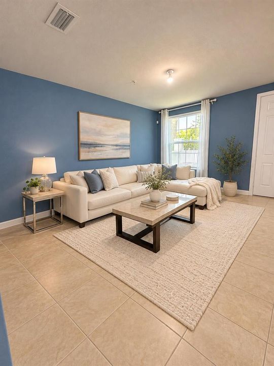 Elegantly staged blue-walled living room