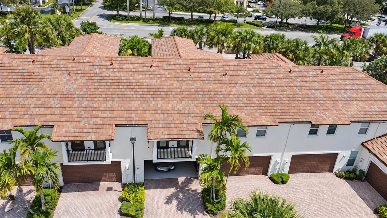 Aerial townhomes with restored driveway
