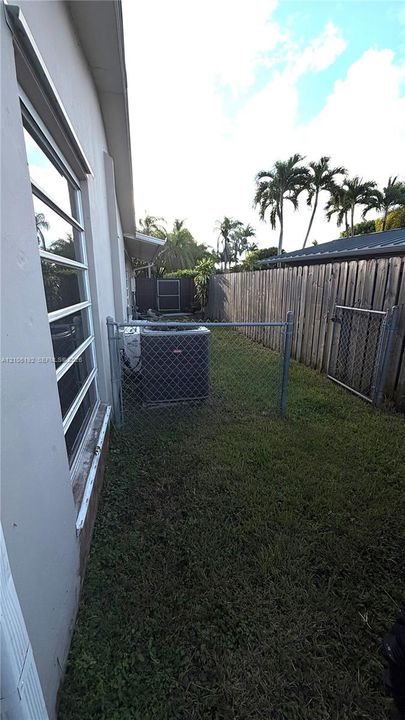 Established wood fence creating a private perimeter