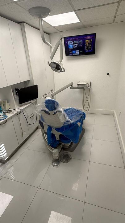 White tile flooring with a glossy finish