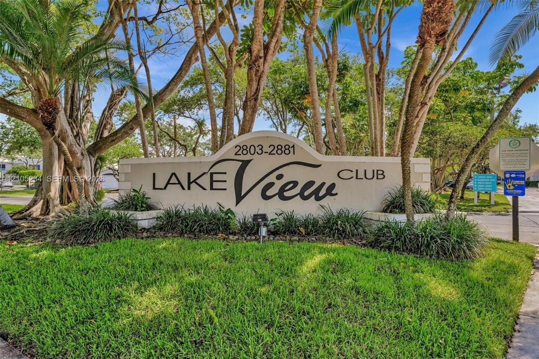 Community entrance signage featuring "Lake View Club" designation