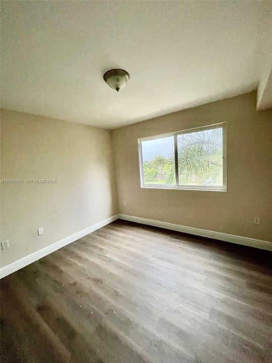 Wood-finish flooring with white trim