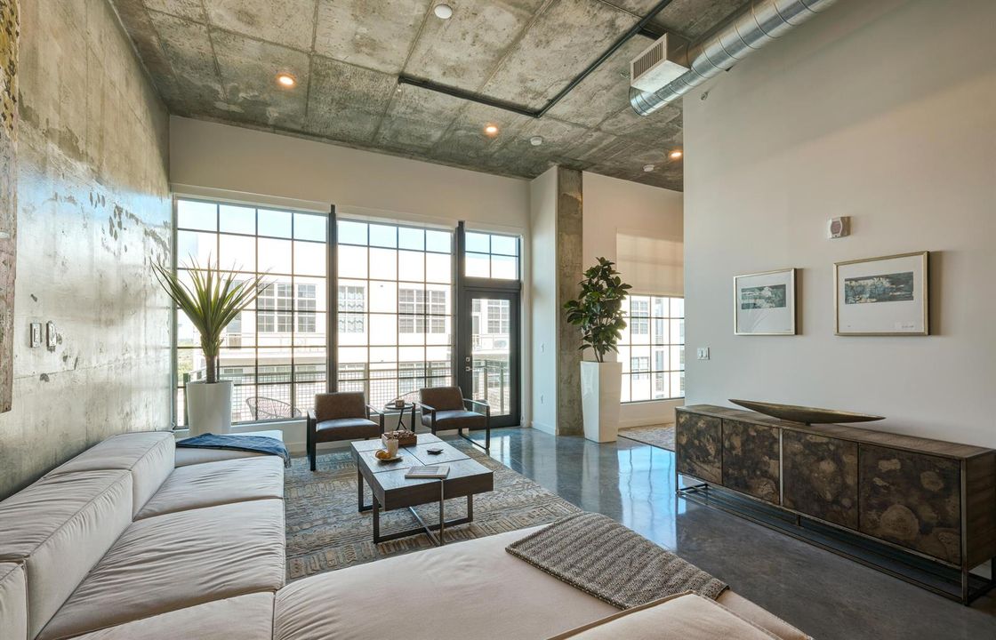 Living room - looking at balcony and bed