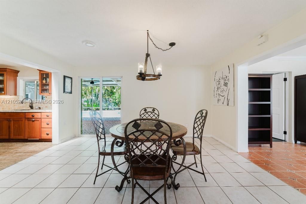 White tile flooring with a neutral wall color throughout