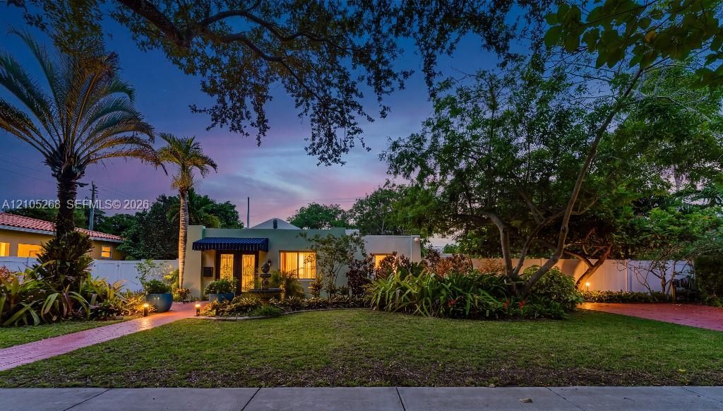 Lush landscaping with mature trees