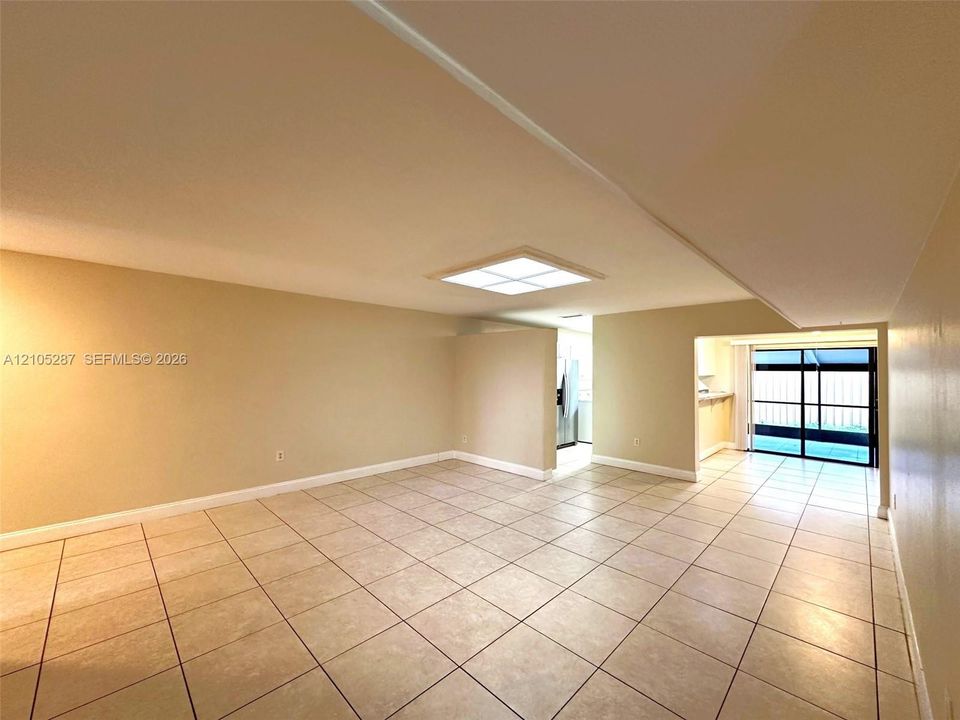 Expansive tiled flooring and neutral wall tones