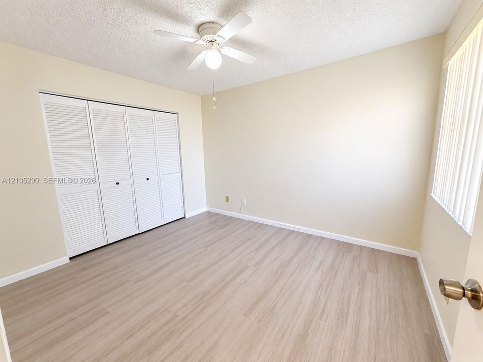 Wood-finish flooring with neutral wall tones