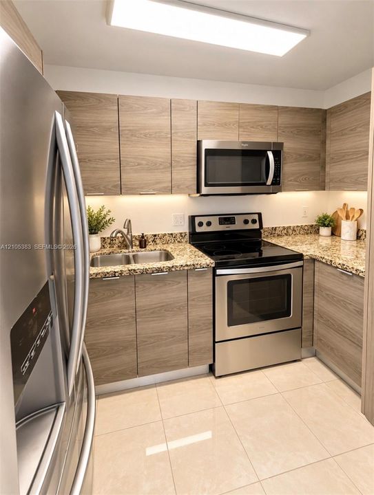 Kitchen featuring wood-finish cabinetry, stainless steel appliances, granite countertops, and tile flooring