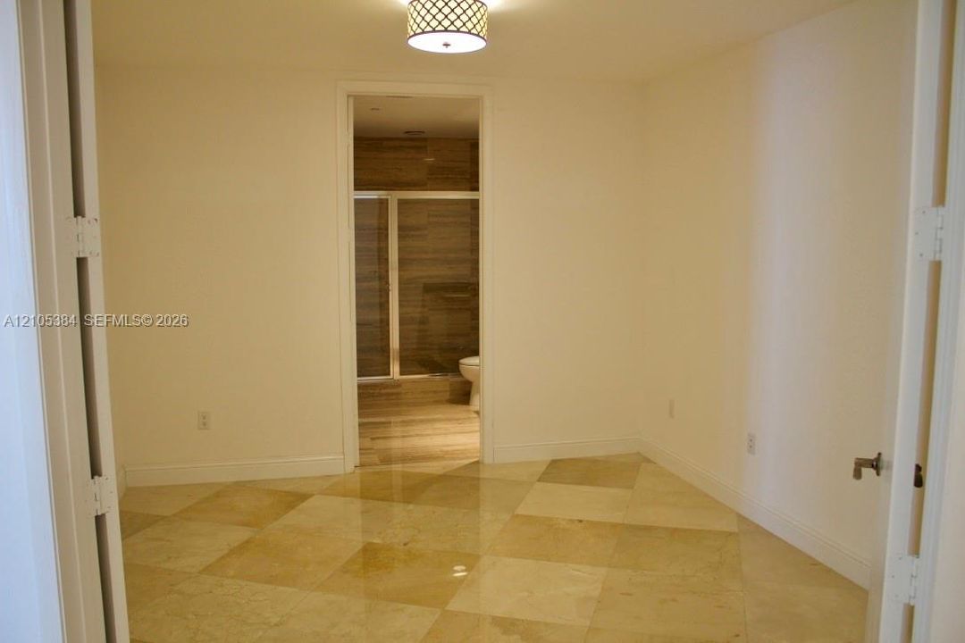 Checkerboard tile flooring with a polished finish