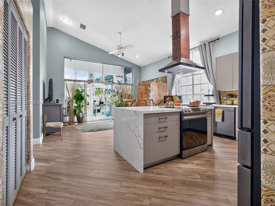 Kitchen featuring a center island with quartz surfacing, ideal for entertaining!