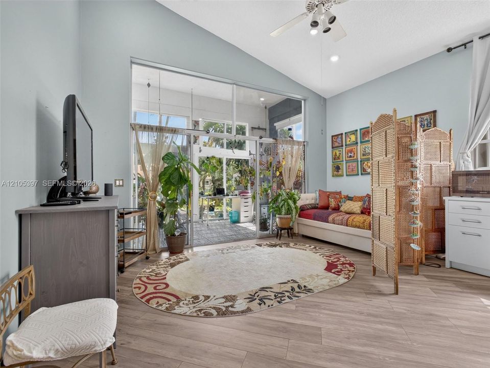 Vaulted ceiling, full of light, adjacent to the kitchen and sun room.