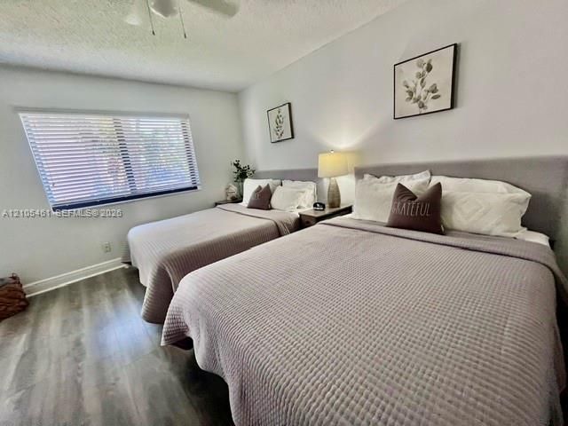 Wood-finish flooring with white walls
