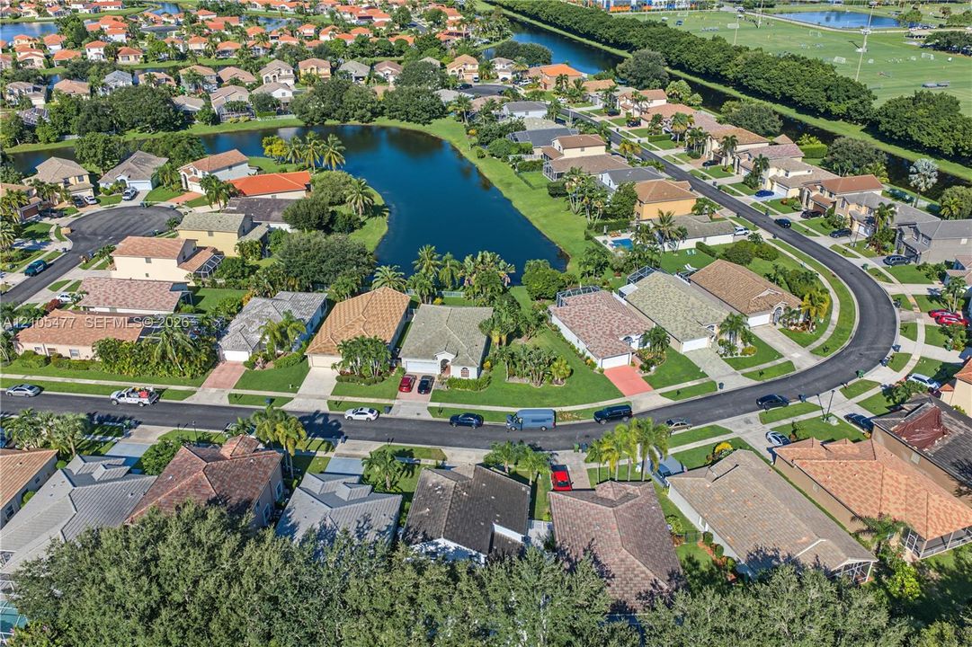 Residential community with a lake feature and extensive green spaces