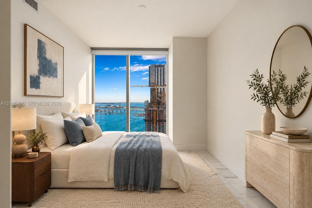 Floor-to-ceiling windows, neutral interior wall tones, and polished stone flooring
