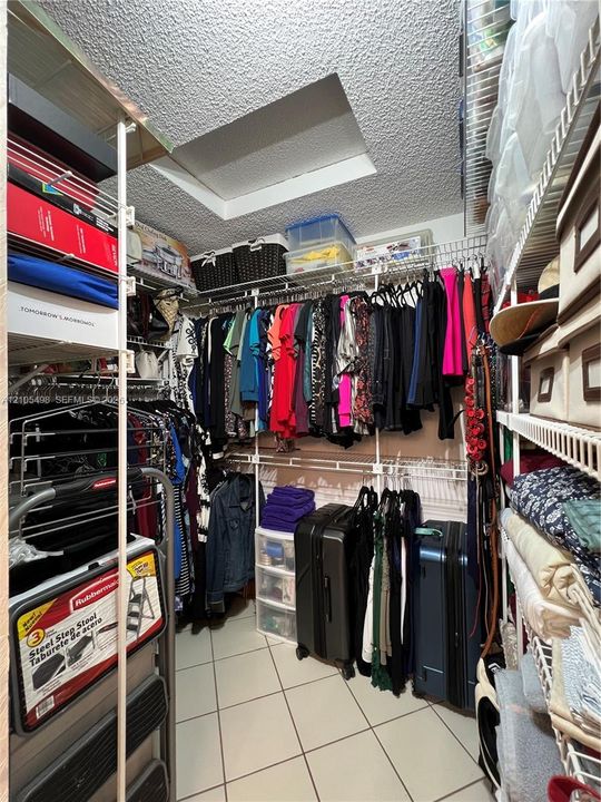 Walking closet in primary bedroom
