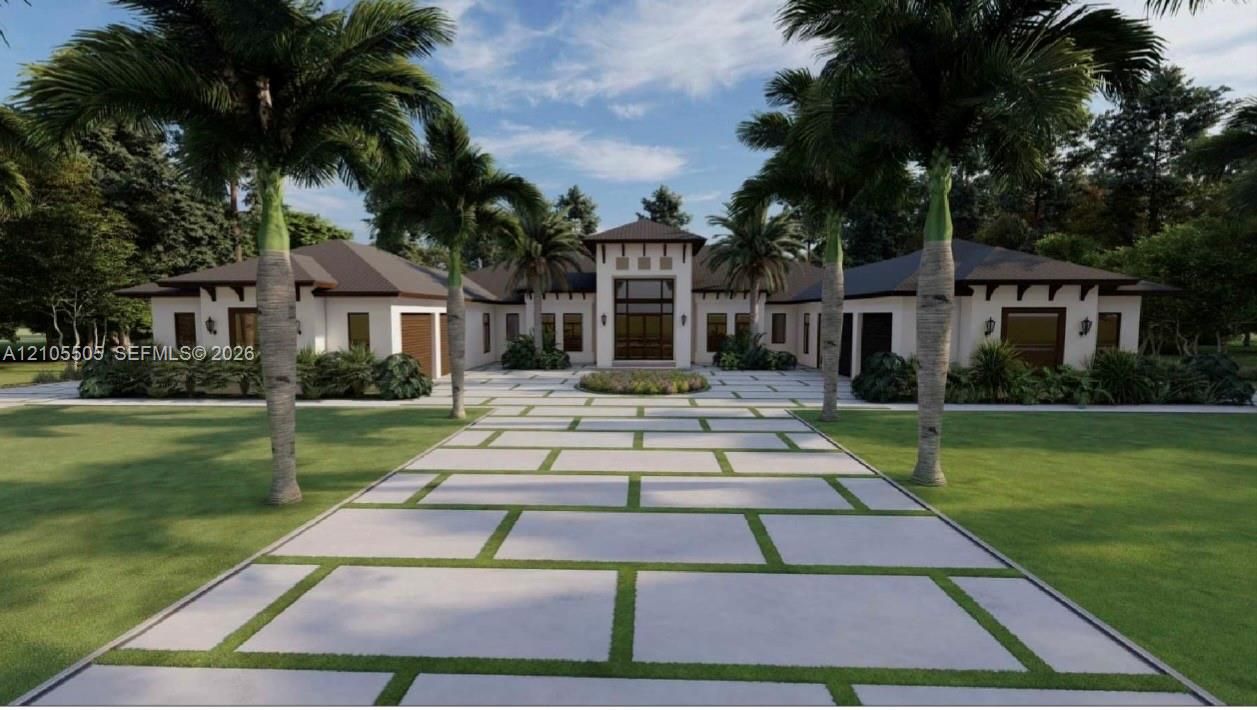 Expansive driveway with large format pavers and grass accents