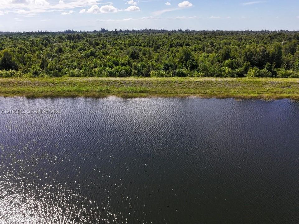 Aerial View of Beautiful Waterway & Nature Preserve directly behind the home