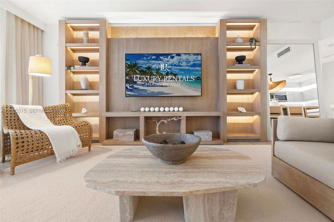 Custom floor-to-ceiling wood shelving unit with integrated LED accent lighting